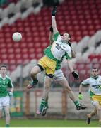 17 November 2013; Ciaran Bonner, Glenswilly, in action against Kevin Cosgrove, Roslea Shamrocks. AIB Ulster Senior Club Football Championship, Semi-Final, Glenswilly, Donegal v Roslea Shamrocks, Fermanagh. Healy Park, Omagh, Co. Tyrone. Picture credit: Oliver McVeigh / SPORTSFILE