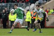 17 November 2013; Niall Cosgrove, Roslea Shamrocks, in action against Joe Gibbons, Glenswilly. AIB Ulster Senior Club Football Championship, Semi-Final, Glenswilly, Donegal v Roslea Shamrocks, Fermanagh. Healy Park, Omagh, Co. Tyrone. Picture credit: Oliver McVeigh / SPORTSFILE