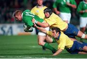 21 November 1998; Jonathan Bell, Ireland, goes over for a try despite the attentions of the Romania defence. Rugby World Cup Qualifier, Ireland v Romania, Lansdowne Road, Dublin. Picture credit: David Maher / SPORTSFILE