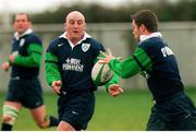 18 November 1998: Ireland's Keith Wood offloads possession to Darragh O'Mahony, right, during squad training. Ireland Rugby Squad Training, Greystones RFC, Greystones, Co. Wicklow. Picture credit: Matt Browne / SPORTSFILE