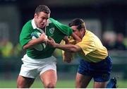 21 November 1998; Kevin Maggs, Ireland, is tackled by Cristian Lupu, Romania. Rugby World Cup Qualifier, Ireland v Romania, Lansdowne Road, Dublin. Picture credit: Brendan Moran / SPORTSFILE