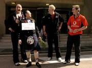 21 January 2005; Groom Mike Siu, from Edinburgh, Scotland, with Laois players Tom Kelly, Padraig Clancy and Joe Higgins before his marriage and the players training in advance of the 2004 Vodafone All-Stars Exhibition Game, 2003 Vodafone All-Stars v 2004 Vodafone All-Stars, Hong Kong Football Club, Hong Kong. Picture credit; Ray McManus / SPORTSFILE