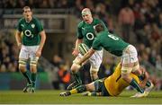 16 November 2013; Peter O'Mahony, 6, Ireland, offloads the ball to team-mate Paul O'Connell. Guinness Series International, Ireland v Australia, Aviva Stadium, Lansdowne Road, Dublin. Picture credit: Brendan Moran / SPORTSFILE