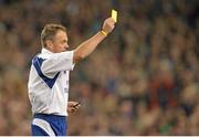 16 November 2013; Referee Chris Pollock shows a yellow card. Guinness Series International, Ireland v Australia, Aviva Stadium, Lansdowne Road, Dublin. Picture credit: Brendan Moran / SPORTSFILE
