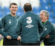 18 November 2013; Republic of Ireland assistant manager Roy Keane, left, manager Martin O'Neill, centre, and equipment officer Mick Lawlor share a joke during squad training ahead of their international friendly against Poland on Tuesday. Republic of Ireland Squad Training, Municipal Stadium, Poznan, Poland. Picture credit: David Maher / SPORTSFILE