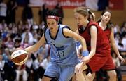 1 February 2005; Lisa Maguire, Colaiste Choilm Ballincollig, Cork, in action against Suil Collins, St. Paul's Oughterard, Galway. All-Ireland Schools Cup, Cadette B Final, Colaiste Choilm Ballincollig, Cork, v St. Paul's Oughterard, Galway, National Basketball  Arena, Tallaght, Dublin. Picture credit; Brian Lawless / SPORTSFILE
