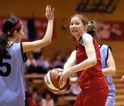 1 February 2005; Maeve Clancy, St. Paul's Oughterard, Galway, in action against Lisa Maguire, left, and Leah Weste, Colaiste Choilm Ballincollig, Cork. All-Ireland Schools Cup, Cadette B Final, Colaiste Choilm Ballincollig, Cork, v St. Paul's Oughterard, Galway, National Basketball Arena, Tallaght, Dublin. Picture credit; Brian Lawless / SPORTSFILE