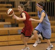 1 February 2005; Sinead Burke, St. Paul's Oughterard, Galway, in action against Vicky St. Ledger, Colaiste Choilm Ballincollig, Cork. All-Ireland Schools Cup, Cadette B Final, Colaiste Choilm Ballincollig, Cork, v St. Paul's Oughterard, Galway, National Basketball  Arena, Tallaght, Dublin. Picture credit; Brian Lawless / SPORTSFILE