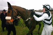 30 January 2005; Moscow Flyer, with jockey Barry Geraghty, in the parade ring after winning the Byrne Group Plc Tied Cottage Steeplechase. Punchestown Racecourse, Co. Kildare. Picture credit; David Maher / SPORTSFILE