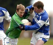 6 February 2005; Michael Reidy, Limerick, in action against Paul McDonald, Laois. Allianz National Football League, Division 1B, Laois v Limerick, O'Moore Park, Portlaoise, Co. Laois. Picture credit; Matt Browne / SPORTSFILE