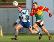 6 February 2005; Thomas Freeman, Monaghan, in action against David Nolan, Carlow. Allianz National Football League, Division 2A, Monaghan v Carlow, O'Neill park, Clontibrit, Co. Monaghan. Picture credit; Pat Murphy / SPORTSFILE