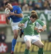 6 February 2005; Roland De Marigny, Italy, in action against Gordon D'Arcy, Ireland. RBS Six Nations Championship 2005, Italy v Ireland, Stadio Flamino, Rome, Italy. Picture credit; Brian Lawless / SPORTSFILE
