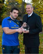 25 November 2013; Leinster's Martin Moore who received his Bank of Ireland player of the month award for October from Pat Finn, Auctioneer and Mediator, Bank Of Ireland, Ballinasloe, Co. Galway. Bank of Ireland Player of the Month for October, UCD, Belfield, Dublin. Picture credit: Barry Cregg / SPORTSFILE