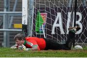 24 November 2013; Shane Curran, St Brigid's goalkeeper, lies injured on the pitch before being substituted during extra time. AIB Connacht Senior Club Football Championship Final, St Brigid's, Roscommon, v Castlebar Mitchels, Mayo. Dr. Hyde Park, Roscommon. Picture credit: David Maher / SPORTSFILE