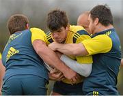 27 November 2013; Munster's Donncha O'Callaghan is tackled by CJ Stander and Damien Varley, right, during squad training ahead of their Celtic League 2013/14, Round 9, game against Newport Gwent Dragons on Friday. Munster Rugby Squad Training, Cork Institute of Technology, Bishopstown, Cork. Picture credit: Matt Browne / SPORTSFILE