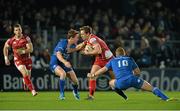 30 November 2013; Aled Thomas, Scarlets, is tackled by Eoin Reddan, left, and Ian Madigan, Leinster. Celtic League 2013/14, Round 9, Leinster v Scarlets, RDS, Ballsbridge, Dublin. Picture credit: Ramsey Cardy / SPORTSFILE