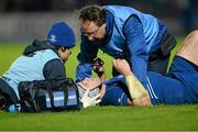 30 November 2013; Shane Jennings, Leinster, is attended to by team physio Karl Denvir, left, and team doctor Dr. John Ryan before leaving the field with an injury. Celtic League 2013/14, Round 9, Leinster v Scarlets, RDS, Ballsbridge, Dublin. Picture credit: Stephen McCarthy / SPORTSFILE