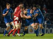 30 November 2013; Rhys Ruddock, Leinster, is tackled by John Barclay, Scarlets. Celtic League 2013/14, Round 9, Leinster v Scarlets, RDS, Ballsbridge, Dublin. Picture credit: Stephen McCarthy / SPORTSFILE