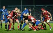 30 November 2013; Mike Ross, Leinster, is tackled by Adam Warren, Scarlets. Celtic League 2013/14 Round 9, Leinster v Scarlets, RDS, Ballsbridge, Dublin. Picture credit: Stephen McCarthy / SPORTSFILE