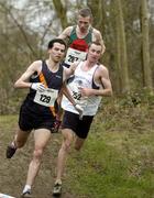 19 February 2005; Eventual winner Gary Murray, St. Malachy's, right, runs alongside eventual second place Mark Kenneally, Clonliffe Harriers A.C., and Seamus Power, behind, during the Senior Mens event. AAI National Inter Club Cross Country Championships, Santry, Dublin. Picture credit; Brian Lawless / SPORTSFILE