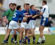 20 February 2005; David Brady, Ballina Stephenites, and Aongus Corry, Kilmurray-Ibrickane, are involved in a scuffle during the game. AIB All-Ireland Club Senior Football Championship Semi-Final, Ballina Stephenites v Kilmurray-Ibrickane, Pearse Stadium, Galway. Due to a colour clash both teams wear their provincial colours. Picture credit; Pat Murphy / SPORTSFILE