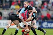 20 February 2005; Trevor Hogan, Munster, in action against Cameron Mather, Glasgow Rugby. Celtic League 2004-2005, Pool 1, Munster v Glasgow Rugby, Thomond Park, Limerick. Picture credit; Kieran Clancy / SPORTSFILE