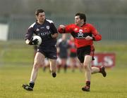 25 February 2005; Chris Toye, Sligo IT, in action against Fergal Griffin, UCC. Datapac Sigerson Cup Semi-Final, Sligo IT v University College Cork, Dundalk IT, Dundalk, Co. Louth. Picture credit; Matt Browne / SPORTSFILE