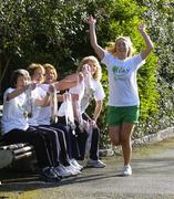 1 March 2005; Mini marathon runners, from left, Betty Hand, Ria Stewart, Margaret Goodwin and Trish Horgan, who have taken part in all previous 22 Women's mini marathons, cheer on Kathryn Thomas, star of RTE's No Frontiers, at the launch of 2005 Flora Women's Mini Marathon, which will take place in Dublin on Monday 6th of June. Merrion Square, Dublin. Picture credit; Brian Lawless / SPORTSFILE