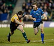 7 December 2013; Gordon D'Arcy, Leinster, is tackled by Glenn Dickson, Northampton Saints. Heineken Cup 2013/14, Pool 1, Round 3, Northampton Saints v Leinster. Franklins Gardens, Northampton, England. Picture credit: Stephen McCarthy / SPORTSFILE