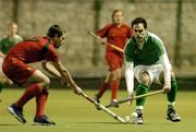 2 March 2005; Stephen Butler, Ireland, in action against Amaury Decock, Belgium. International Hockey Friendly, Ireland v Belgium, Grange Road, Rathfarnham, Dublin. Picture credit; Brendan Moran / SPORTSFILE