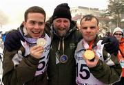 4 March 2005; Fergus Finlay, Chairperson, Special Olympics Ireland with Irish winners Warren Tate, Silver, left, and Cormac Maguire, right,  who won Gold in the Alpine Intermediate Slalom event. 2005 Special Olympics World Winter Games, Ichinose Ski Resort, Nagano, Japan. Team Ireland is sponsored by eircom. Picture credit; Ray McManus / SPORTSFILE