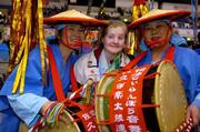 5 March 2005; Fiona Bryson, Ireland, who won a Bronze medal at the Games, with two menbers of the local Osuwadaike drumming band at the Closing Ceremony of the 2005 Special Olympics World Winter Games, M-Wave Stadium, Nagano, Japan. Picture credit; Ray McManus / SPORTSFILE