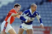 6 March 2005; Tom Kelly, Laois, in action against Stephen Kernan, Armagh. Allianz National Football League, Division 1B, Laois v Armagh, O'Moore Park, Portlaoise, Co. Laois. Picture credit; Brendan Moran / SPORTSFILE