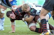 8 December 2013; Connacht's Fionn Carr and Louis Picamoles, Toulouse, battle for possession during the game. Heineken Cup 2013/14, Pool 3, Round 3, Toulouse v Connacht, Stade Ernest Wallon, Toulouse, France. Picture credit: Manuel Blondeau / SPORTSFILE