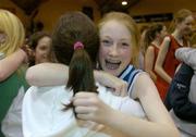 8 March 2005; Julie Curtin, Ursuline Convent, Cork, celebrates with a schoolmate after victory in the final. Schools League Final, Cadette B Girls, Ursuline Convent, Cork v St. Pauls Oughterard, National Basketball Arena, Tallaght, Dublin. Picture credit; Brian Lawless / SPORTSFILE