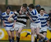 8 March 2005; Peter Toal, Belvedere College, is tackled by  Alan MacGinty, Blackrock College. Leinster Schools Junior Cup, Quarter-Final, Blackrock College v Belvedere College, Donnybrook, Dublin. Picture credit; Paul Davis / SPORTSFILE