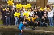 11 March 2005; Rob Love, Bank of Ireland, is congratulated by co-workerrs work after canoeing to work in Dublin city centre from Celbridge, Co. Kildare in aid of Daffodil Day which is sponsored by Bank of Ireland. Mount Street Bridge, Dublin. Picture credit; Pat Murphy / SPORTSFILE