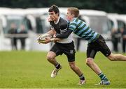 11 December 2013; Kevin Kyne, Newbridge College, is tackled by Stephen Bourke, St. Gerard’s School. Leinster Schools Junior Section B League Final, St. Gerard’s School v Newbridge College, Templeville Road, Dublin. Picture credit: Matt Browne / SPORTSFILE