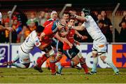 14 December 2013; Paul O'Connell, Munster, is tackled by Lifeimi Mafi, left, and Luke Narraway, Perpignan. Heineken Cup 2013/14, Pool 6, Round 4, Perpignan v Munster. Stade Aimé Giral, Perpignan, France. Picture credit: Diarmuid Greene / SPORTSFILE