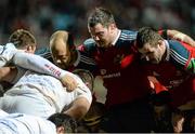 14 December 2013; The Munster front row, BJ Botha, left, Damien Varley, centre, and James Cronin prepare for a scrum. Heineken Cup 2013/14, Pool 6, Round 4, Perpignan v Munster. Stade Aimé Giral, Perpignan, France. Picture credit: Diarmuid Greene / SPORTSFILE