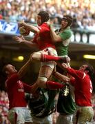 19 March 2005; Ryan Jones, Wales, wins possession in the line-out from Simon Easterby, Ireland. RBS Six Nations Championship 2005, Wales v Ireland, Millennium Stadium, Cardiff, Wales. Picture credit; Pat Murphy / SPORTSFILE