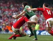 19 March 2005; Simon Easterby, Ireland, is tackled by Michael Owen, left and Rhys Williams, Wales. RBS Six Nations Championship 2005, Wales v Ireland, Millennium Stadium, Cardiff, Wales. Picture credit; Pat Murphy / SPORTSFILE