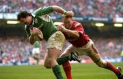 19 March 2005; Marcus Horan, Ireland, is tackled by Martyn Williams, Wales, on his way to scoring his sides first try. RBS Six Nations Championship 2005, Wales v Ireland, Millennium Stadium, Cardiff, Wales. Picture credit; Pat Murphy / SPORTSFILE