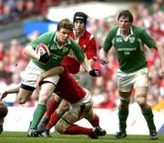 19 March 2005; Brian O'Driscoll, Ireland, is tackled by Martyn Williams, Wales. RBS Six Nations Championship 2005, Wales v Ireland, Millennium Stadium, Cardiff, Wales. Picture credit; Brendan Moran / SPORTSFILE