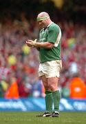 19 March 2005; John Hayes, Ireland, takes the tape off his wrists after the game. RBS Six Nations Championship 2005, Wales v Ireland, Millennium Stadium, Cardiff, Wales. Picture credit; Pat Murphy / SPORTSFILE