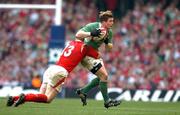 19 March 2005; Brian O'Driscoll, Ireland, is tackled by Tom Shanklin, Wales. RBS Six Nations Championship 2005, Wales v Ireland, Millennium Stadium, Cardiff, Wales. Picture credit; Pat Murphy / SPORTSFILE