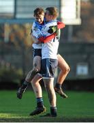 19 December 2013; Fergal Stack, left, celebrates victory with team-mate Shane Monaghan, Maynooth Post Primary. Dublin Schools Senior “A” Football Final, St Benildus College v Maynooth Post Primary. O'Toole Park, Crumlin, Dublin. Picture credit: Piaras Ó Mídheach / SPORTSFILE