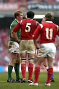 19 March 2005; Referee Chris White speaks to Paul O'Connell, Ireland, and Robert Sidoli (5), Wales. RBS Six Nations Championship 2005, Wales v Ireland, Millennium Stadium, Cardiff, Wales. Picture credit; Brendan Moran / SPORTSFILE