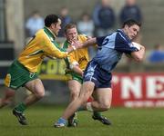 20 March 2005; Declan Lally, Dublin, in action against Damien Diver, left, and Brian Roper, Donegal. Allianz National Football League, Division 1A, Dublin v Donegal, Parnell Park, Dublin. Picture credit; Brian Lawless / SPORTSFILE