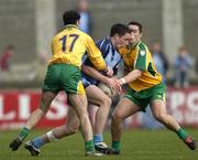 20 March 2005; Declan Lally, Dublin, in action against Damien Diver, left, and Kevin Cassidy, Donegal. Allianz National Football League, Division 1A, Dublin v Donegal, Parnell Park, Dublin. Picture credit; Brian Lawless / SPORTSFILE